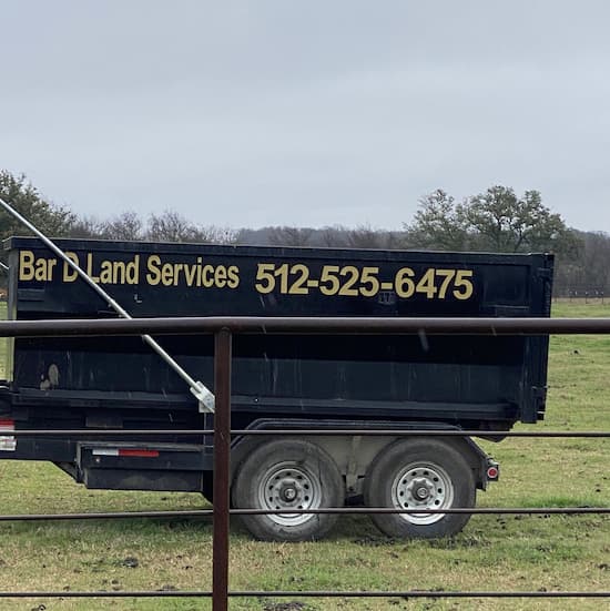 Roll off dumpster delivered to a residential driveway