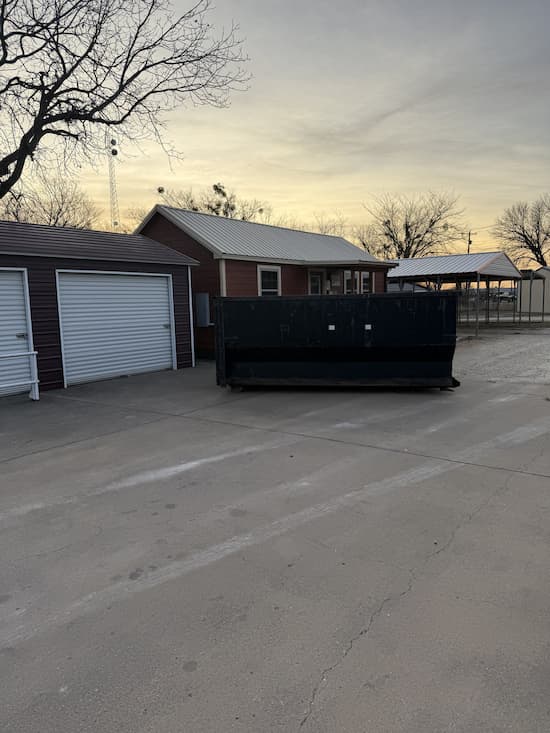 Roll off dumpster delivered to a job site